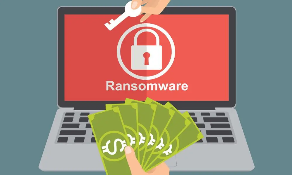 Ilustración de un ordenador bloqueado por ransomware, con una pantalla roja, un candado, billetes de dinero y una mano ofreciendo una llave como rescate